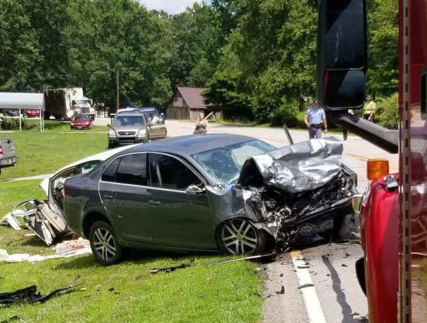 THREE INJURED IN HEAD-ON COLLISION